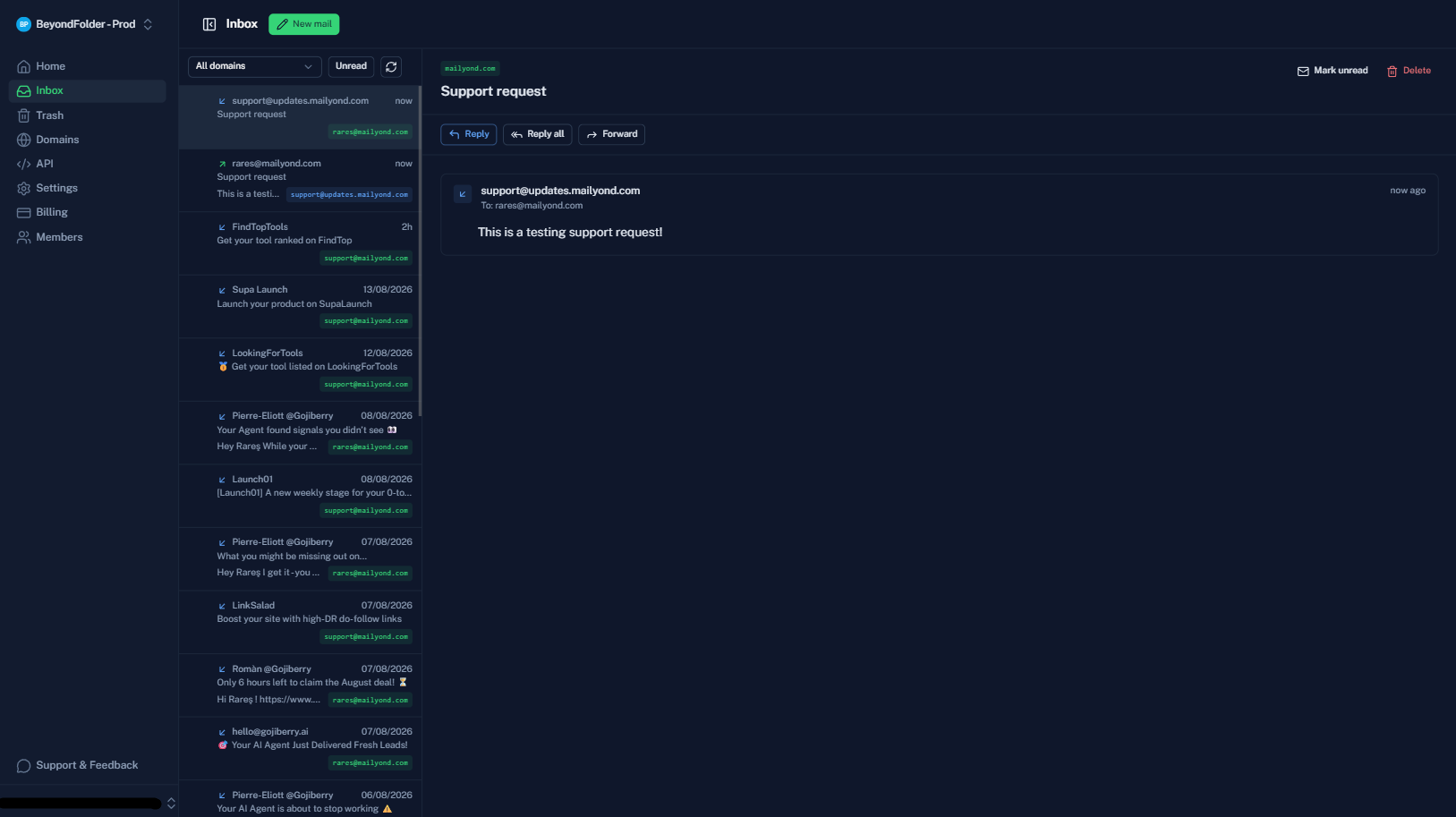 The Mailyond inbox with a message list, per-domain tags on each email, and an open support request with reply, reply all and forward buttons.